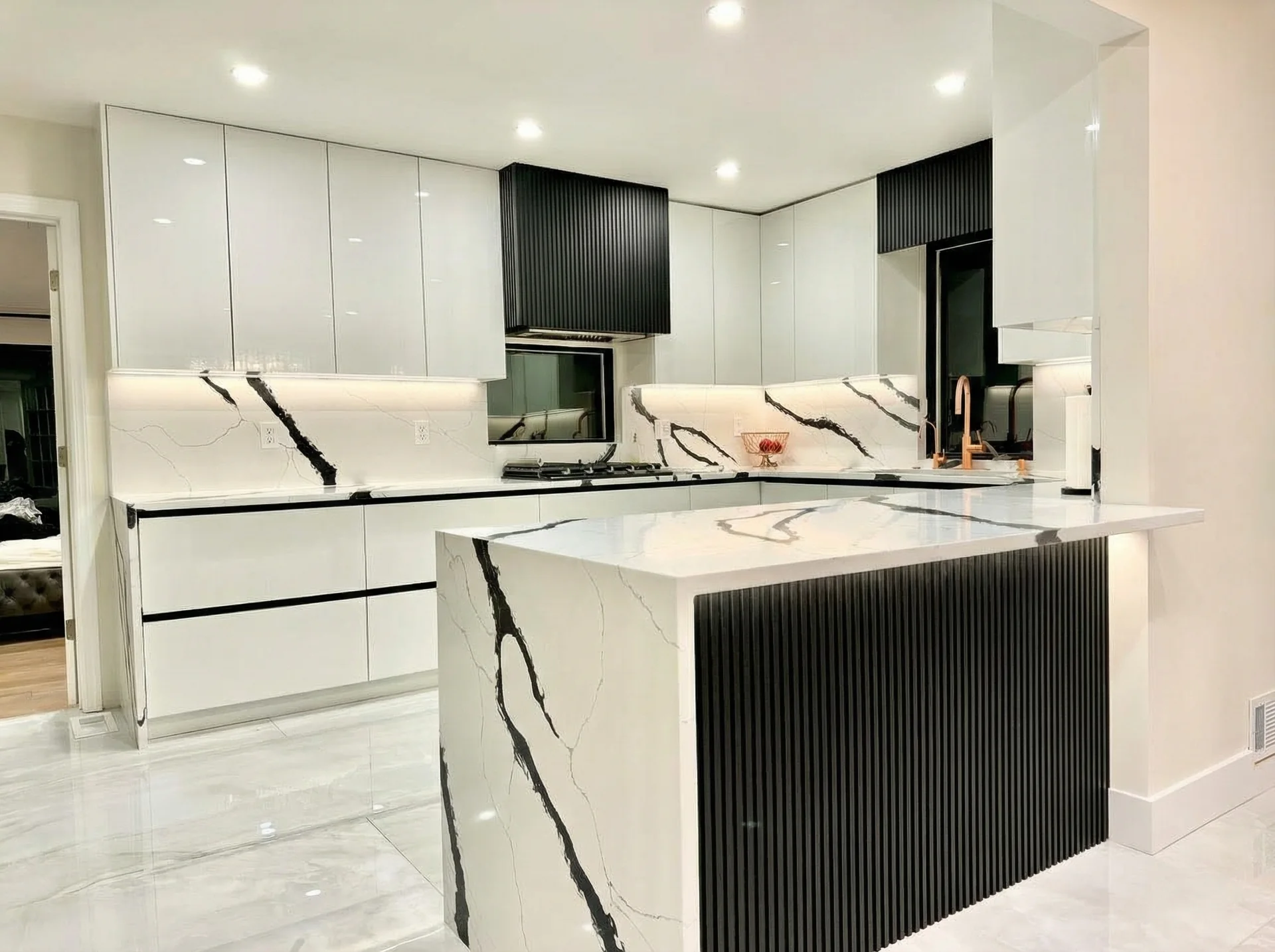 Waterfall island edge and black fluted island panels